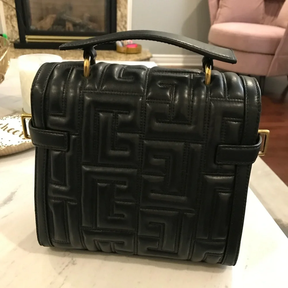 Balmain
B-Buzz 23 leather bag Black and Gold Quilted Shoulder Bag - Picture 15 of 15